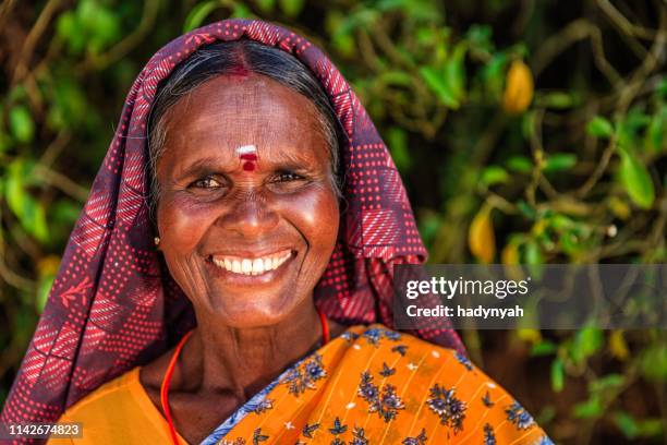 portrait of tamil woman on tea plantation, southern india - indian agriculture stock pictures, royalty-free photos & images