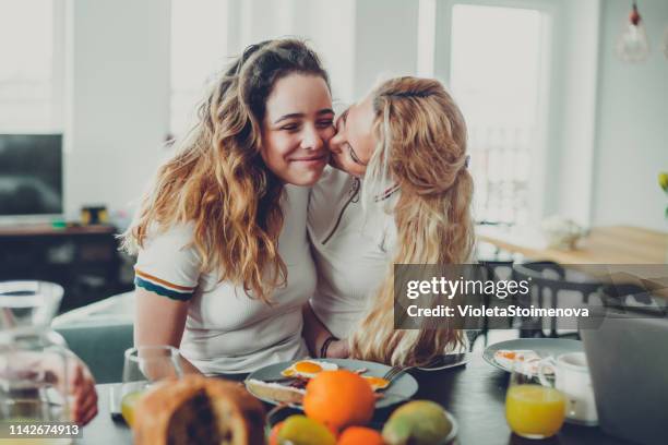 mother and teenage girl - outdoor kitchen stock pictures, royalty-free photos & images