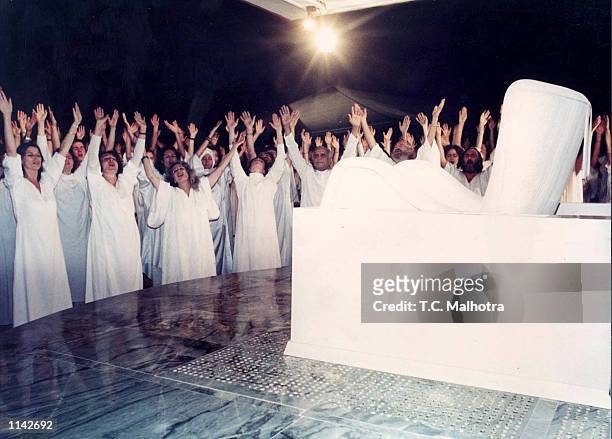 Members of the Osho Ashram in Pune, India celebrate the 1st anniversary of the death of their leader the Bhagwan Rajneesh later known as Osho around...