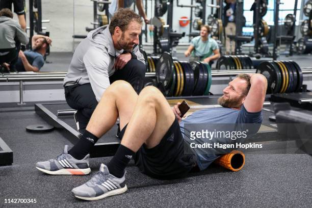 Kieran Read talks to strength and conditioning coach Nic Gill during a gym session at Les Mills on April 15, 2019 in Wellington, New Zealand.
