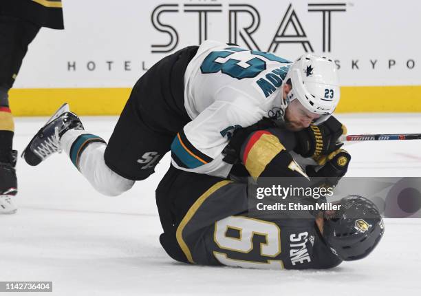 Barclay Goodrow of the San Jose Sharks and Mark Stone of the Vegas Golden Knights fight in the second period of Game Three of the Western Conference...