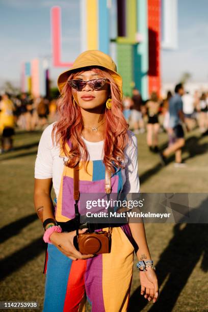 Festivalgoer street style is seen at The 2019 Coachella Valley Music and Arts Festival Weekend 1 on April 14, 2019 in Indio, California.