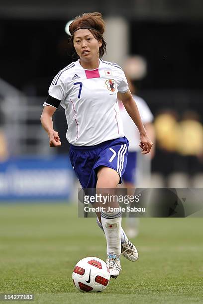 Kozue Ando of Japan controls the ball against the United States on May 14, 2011 at Crew Stadium in Columbus, Ohio.