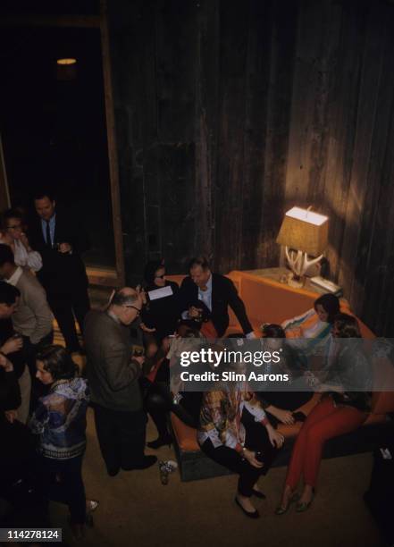 Group of people attending a party at the chalet of stockbroker A Albert Sack Jr at the Sugarbush Mountain ski resort in in Warren, Vermont, December...