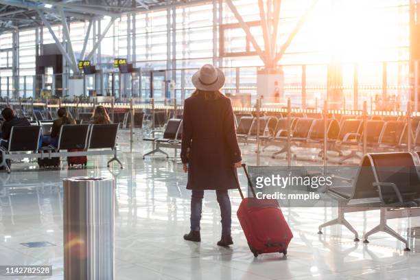 going on a big journey - carry on luggage stock pictures, royalty-free photos & images