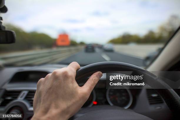 traffic jam from the driver's perspective - driver steering wheel stock pictures, royalty-free photos & images