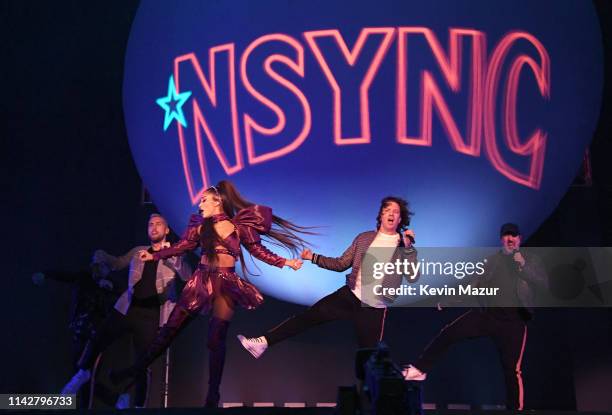 Ariana Grande performs with members of NSYNC Chris Kirkpatrick, Lance Bass, JC Chasez and Joey Fatone on Coachella Stage during the 2019 Coachella...