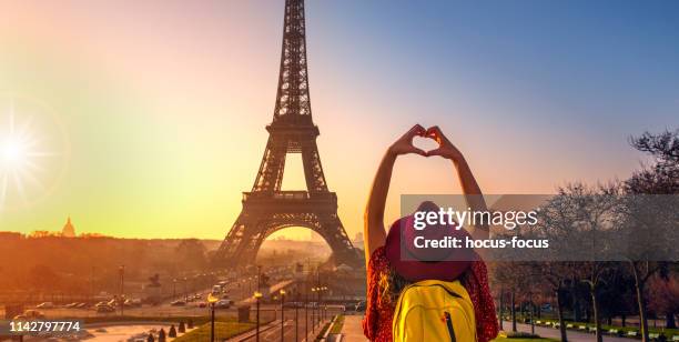 i love paris - person eiffel tower stock pictures, royalty-free photos & images