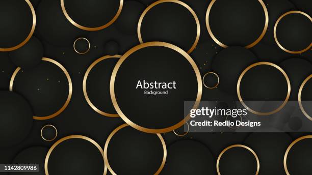 abstract gold rings on black background - neon gold stock illustrations