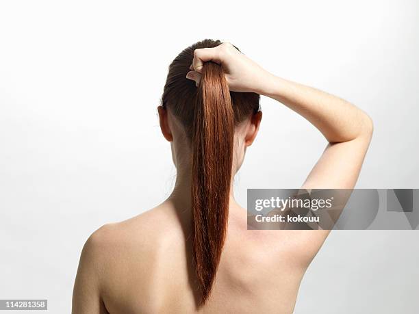 back of woman - ponytail stock pictures, royalty-free photos & images