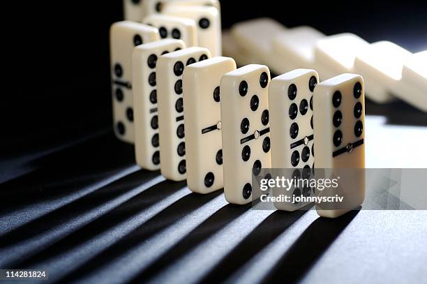 dominoes v5... - dominos falling stock pictures, royalty-free photos & images