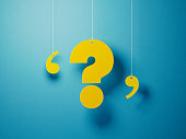 Yellow Question Mark With String Over Blue Background