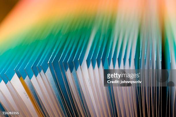 colourful french folded pages... - document stock pictures, royalty-free photos & images
