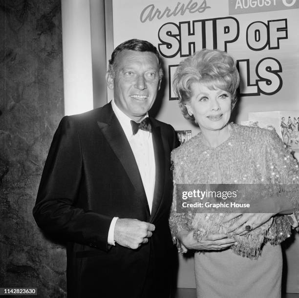 American actress, comedian, and producer Lucille Ball and her husband, American stand-up comedian Gary Morton attend the premiere of the film 'Ship...