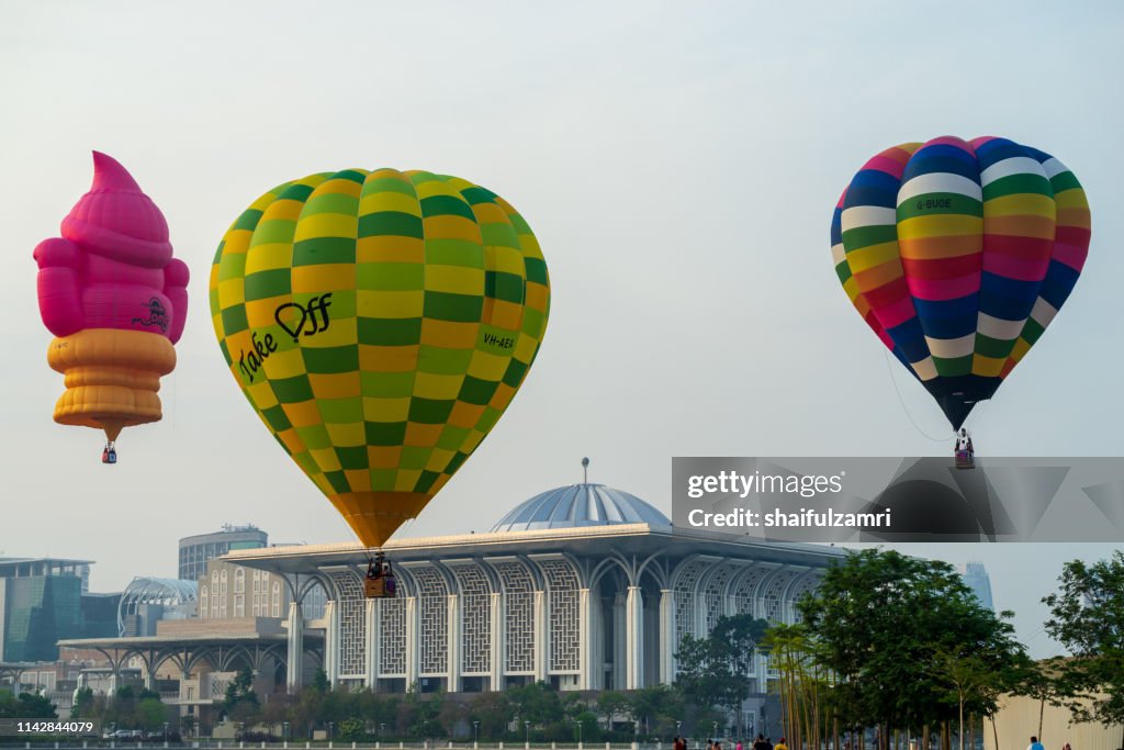 Morning view with hot balloons over lake Putrajaya, Malaysia.