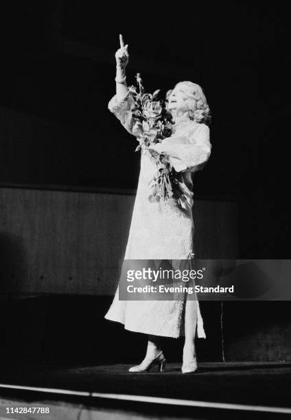 American film actress Bette Davis performing on stage, UK, 9th October 1975.