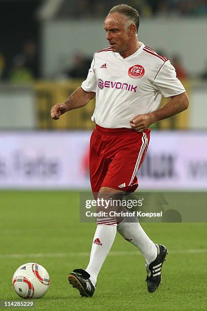 Michael Rummenigge of Japan runs with the ball during the charity match between Borussia Dortmund and a Team of Japan at the Schauinsland Reisen...