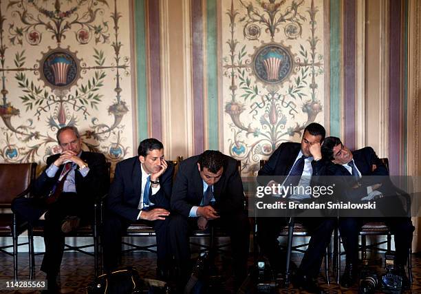 Members of the Jordanian press and others wait for a meeting between Jordan's King Abdullah and the Senate Foreign Relations Committee on Capitol...