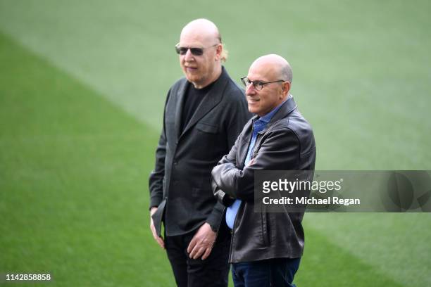 Avram Glazer, Owner of Manchester United looks on as they attend a training session ahead of their second leg in the UEFA Champions League Quarter...