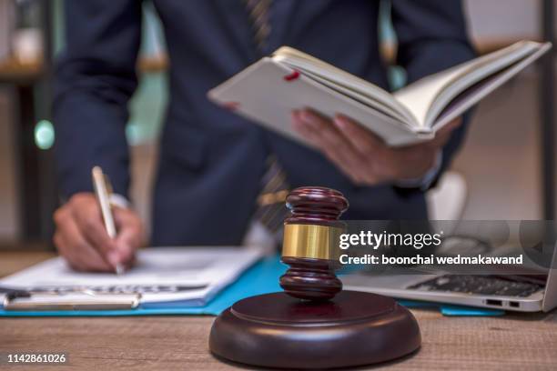 judge gavel with justice lawyers, businesswoman in suit or lawyer, advice and legal services concept. - notar stock-fotos und bilder