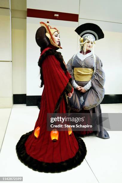 Portrait of two people, both dressed as 'Padme Amidala,' at the Star Wars Celebration event at Wintrust Arena, Chicago, Illinois, April 13, 2019.