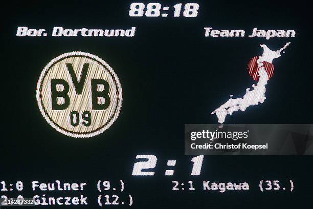 The video scrren shows the result of the charity match between Borussia Dortmund and a Team of Japan at the Schauinsland Reisen Arena on May 17, 2011...