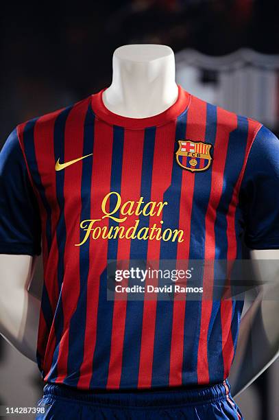The new FC Barcelona shirt is displayed during the official presentation at Nou Camp Stadium on May 17, 2011 in Barcelona, Spain.