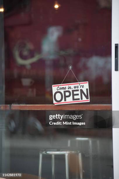 close up of open sign on cafe door - restaurant opening stock pictures, royalty-free photos & images