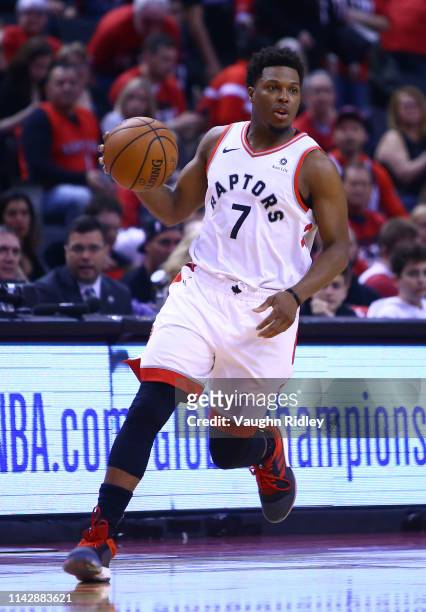 Kyle Lowry of the Toronto Raptors dribbles the ball during Game One of the first round of the 2019 NBA playoffs against the Orlando Magic at...