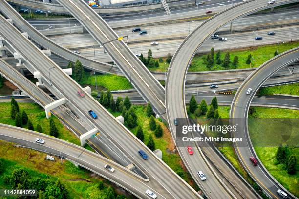 aerial view of interstate change overpasses - pedaggio foto e immagini stock