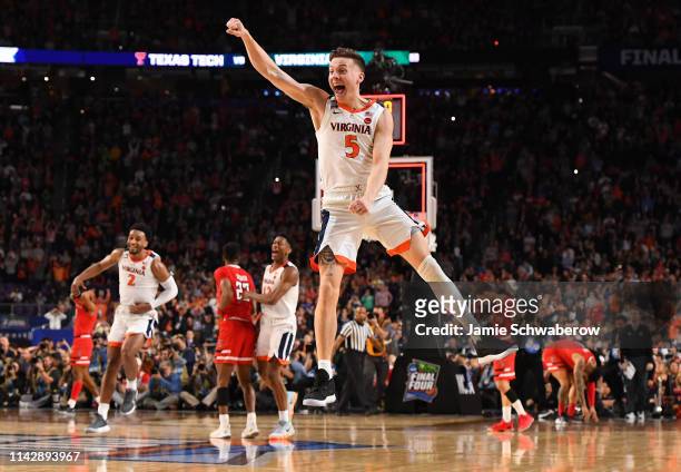 Kyle Guy of the Virginia Cavaliers celebrates after defeating the Texas Tech Red Raiders in the 2019 NCAA Photos via Getty Images men's Final Four...