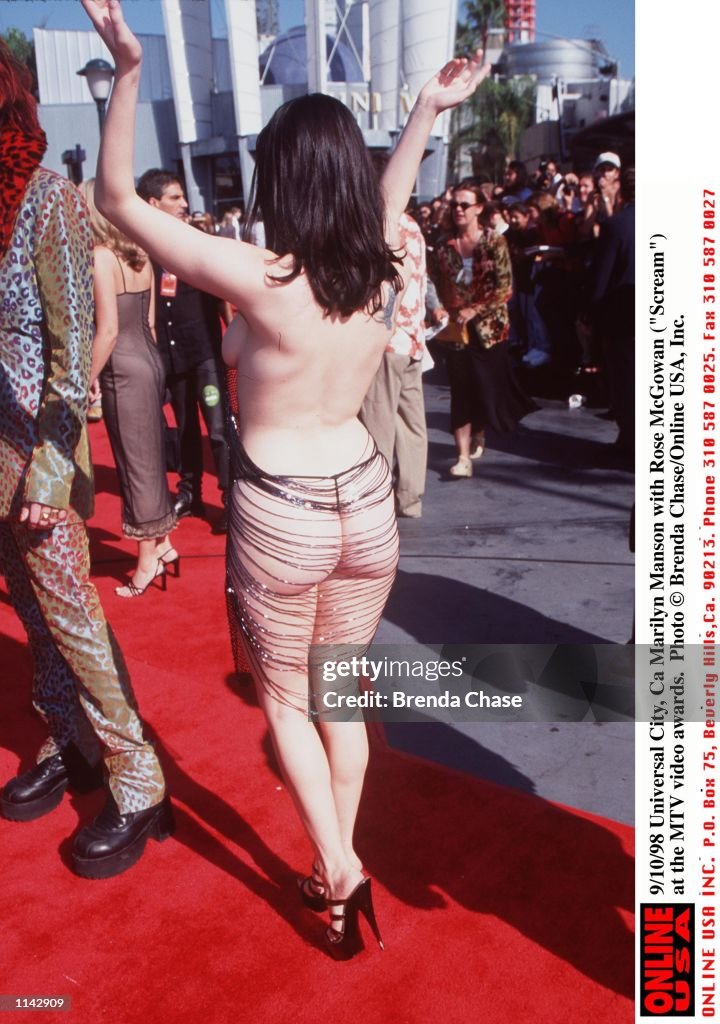 9/10/98 Universal City, Ca Marilyn Manson with Rose McGowan ("Scream") at the MTV awards..