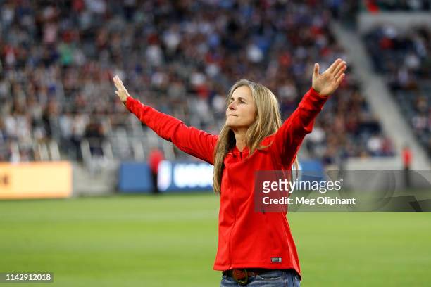World Cup champion Brandi Chastain of the 1999 United States Women's National Team makes a halftime appearance during the game against Belgium at...