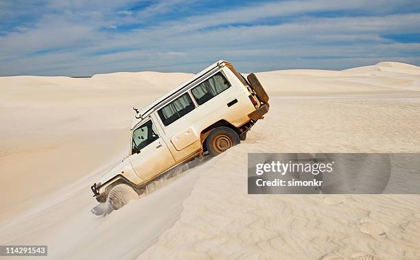 driving over sand dunes - lancelin stock pictures, royalty-free photos & images