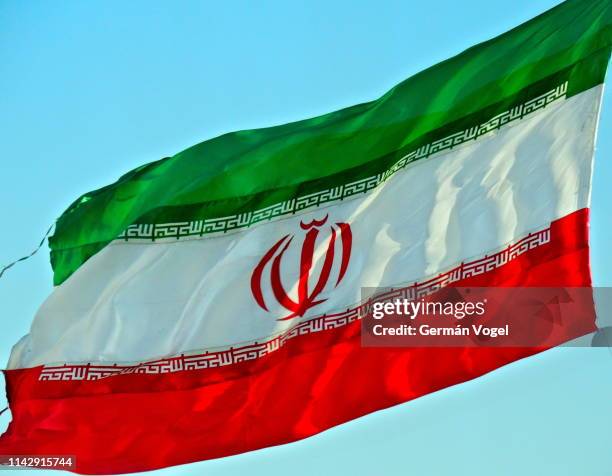 iran flag waving - iranian flag stock pictures, royalty-free photos & images