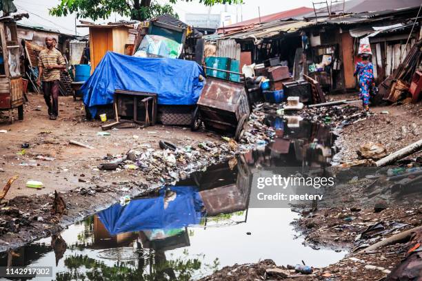 slum life-lagos, nigeria - nigeria city stock-fotos und bilder