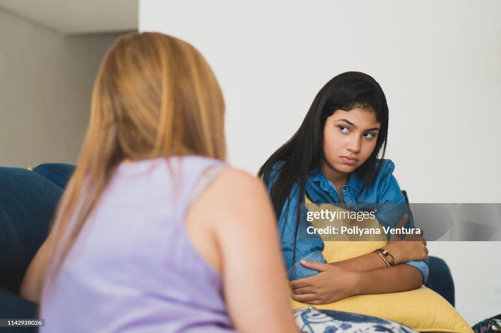 Mother giving good advice to her daughter
