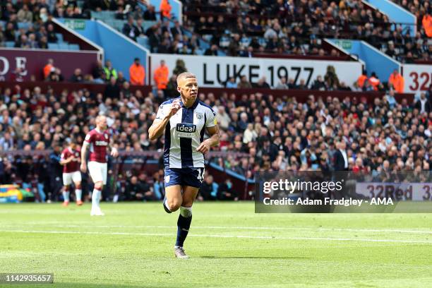 Dwight Gayle of West Bromwich Albion celebrates after scoring a goal to make it 0-1 during the Sky Bet Championship Play-off Semi Final: First Leg...