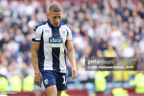 Dwight Gayle of West Bromwich Albion reacts as he receives a red card following a challenge on goalkeeper Jed Steer of Aston Villa during the Sky Bet...