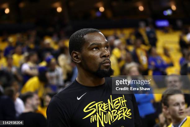 Kevin Durant of the Golden State Warriors walks out of the tunnel to warm up before their game against the LA Clippers in Game Two of the first round...