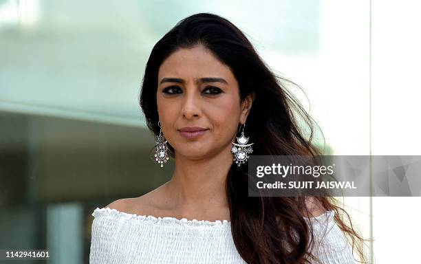 Indian Bollywood actress Tabu poses for photographs during the promotion of her upcoming romantic comedy Hindi film entitled 'De De Pyaar De' in...