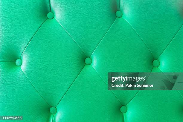 green leather and textured background - upholstered furniture stock pictures, royalty-free photos & images