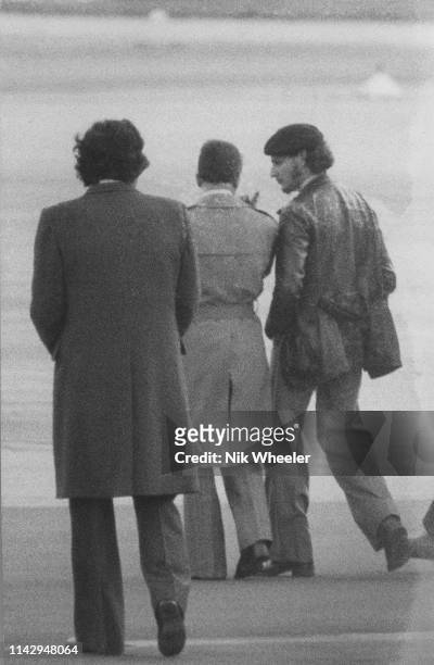 Carlos the Jackal walks on runway of Algiers airport with Algerian Minister for Foreign Affairs Abdel Aziz Bouteflika as he negotiates a deal to free...