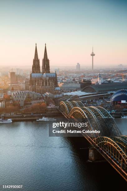 cologne cathedral and bridge at sunset, germany - koln 個照片及圖片檔