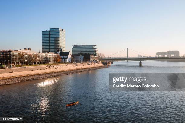 deutz bridge and riverbank on the rhine, cologne, germany - cologne skyline stock pictures, royalty-free photos & images
