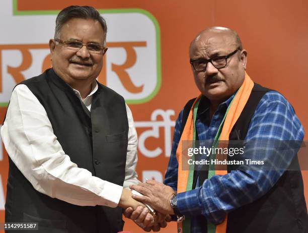 Bollywood actor Arun Bakshi joins the Bharatiya Janata Party in the presence of former Chhattisgarh Chief Minister Raman Singh, at BJP headquarters,...