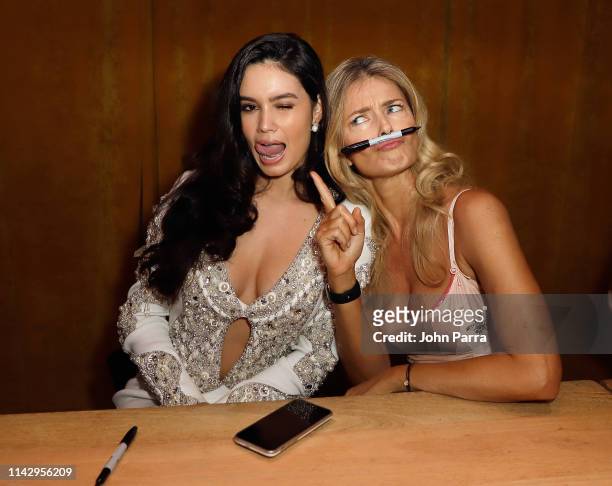 Anne de Paula and Paulina Porizkova attend the Sports Illustrated Swimsuit 2019 Issue Launch at Seaspice on May 10, 2019 in Miami, Florida.