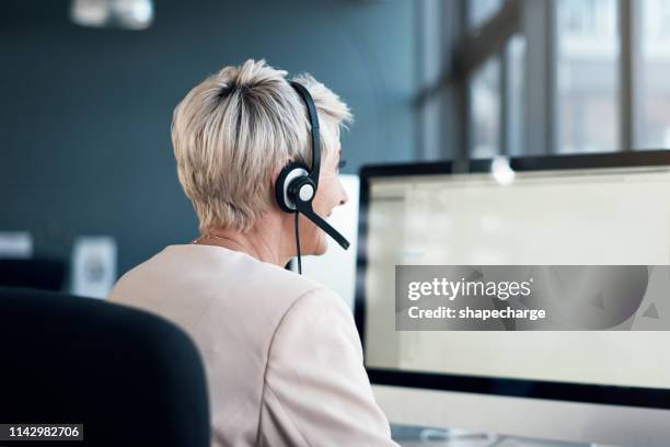 help is just a phone call away - computer headset stock pictures, royalty-free photos & images