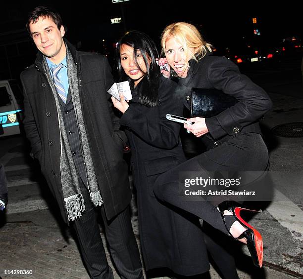 Guests pose for photos during the distribution of Ciroc debit cards for yellow cab fares on New Year's Eve hosted by Ciroc Vodka on December 31, 2008...