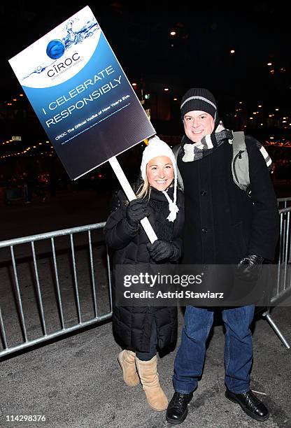 Guests pose for photos during the distribution of Ciroc debit cards for yellow cab fares on New Year's Eve hosted by Ciroc Vodka on December 31, 2008...